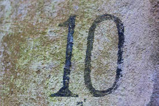 The number 10 on a rock, representing the Law of God which teaches us how to love God and others