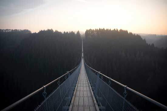 Bridge across a valley just as the deity of Christ links Jesus to heaven & the humanity of Christ links Jesus to Earth