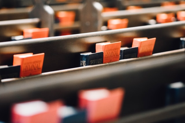 Adventist hymnals found in pew pockets.