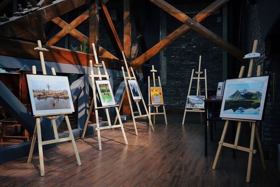 Easels with paintings that showcase the creative ability God has given humans