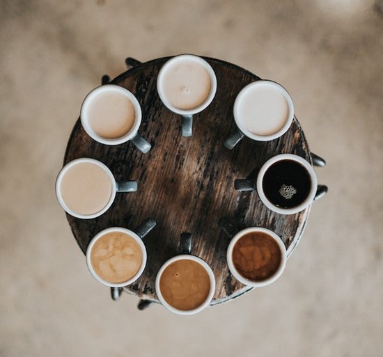 A table with mugs of coffee, a drink that many Adventists leave out of their diet because of its caffeine content