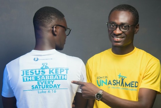 Two Christians wearing shirts with Bible references