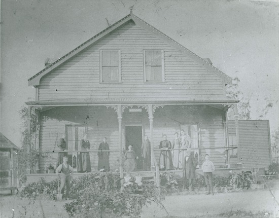 Ellen White sitting on the front porch of her home in Cooranbong, Australia, called Sunnyside