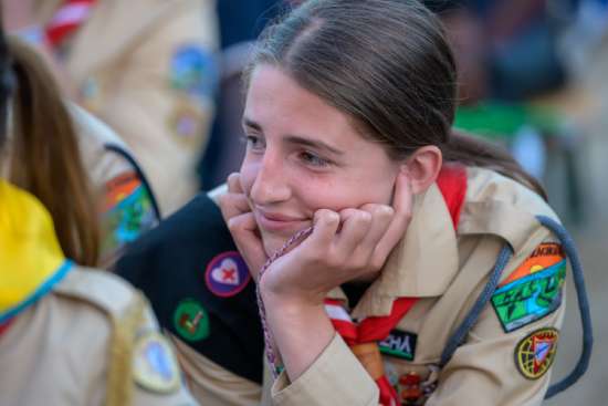 A young girl wearing her full Pathfinder uniform