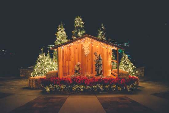 A nativity, a popular Christmas display, depicts Mary and Joseph in a stable, looking down at Baby Jesus.