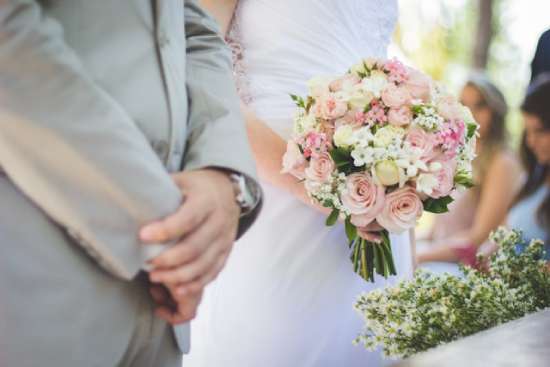 A bride and groom standing together, describing the sacredness of marriage