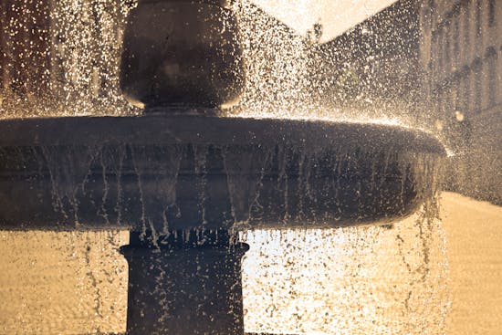 A fountain with water cascading over its edges