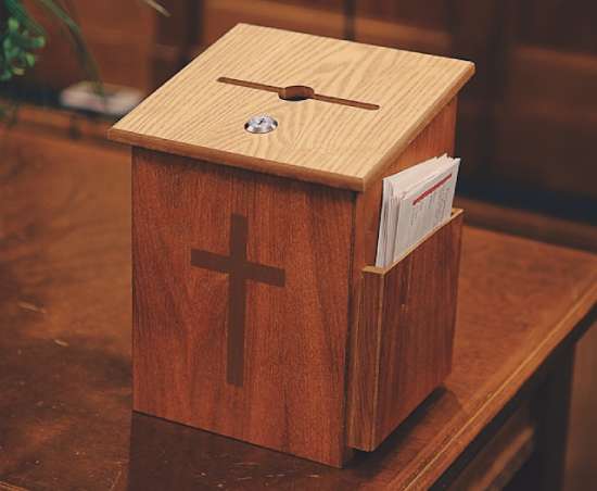 A wooden offering box.